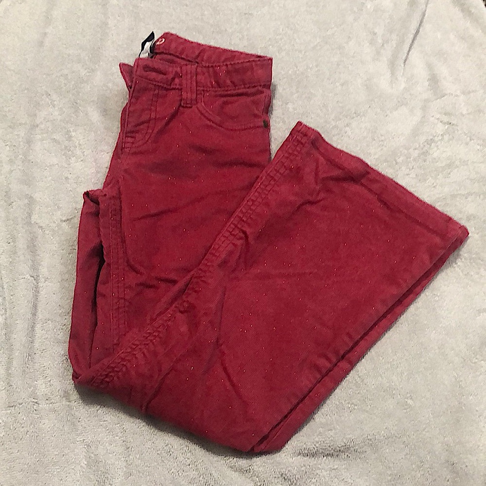 These are vintage sparkling pink flaired jeans by Gap.